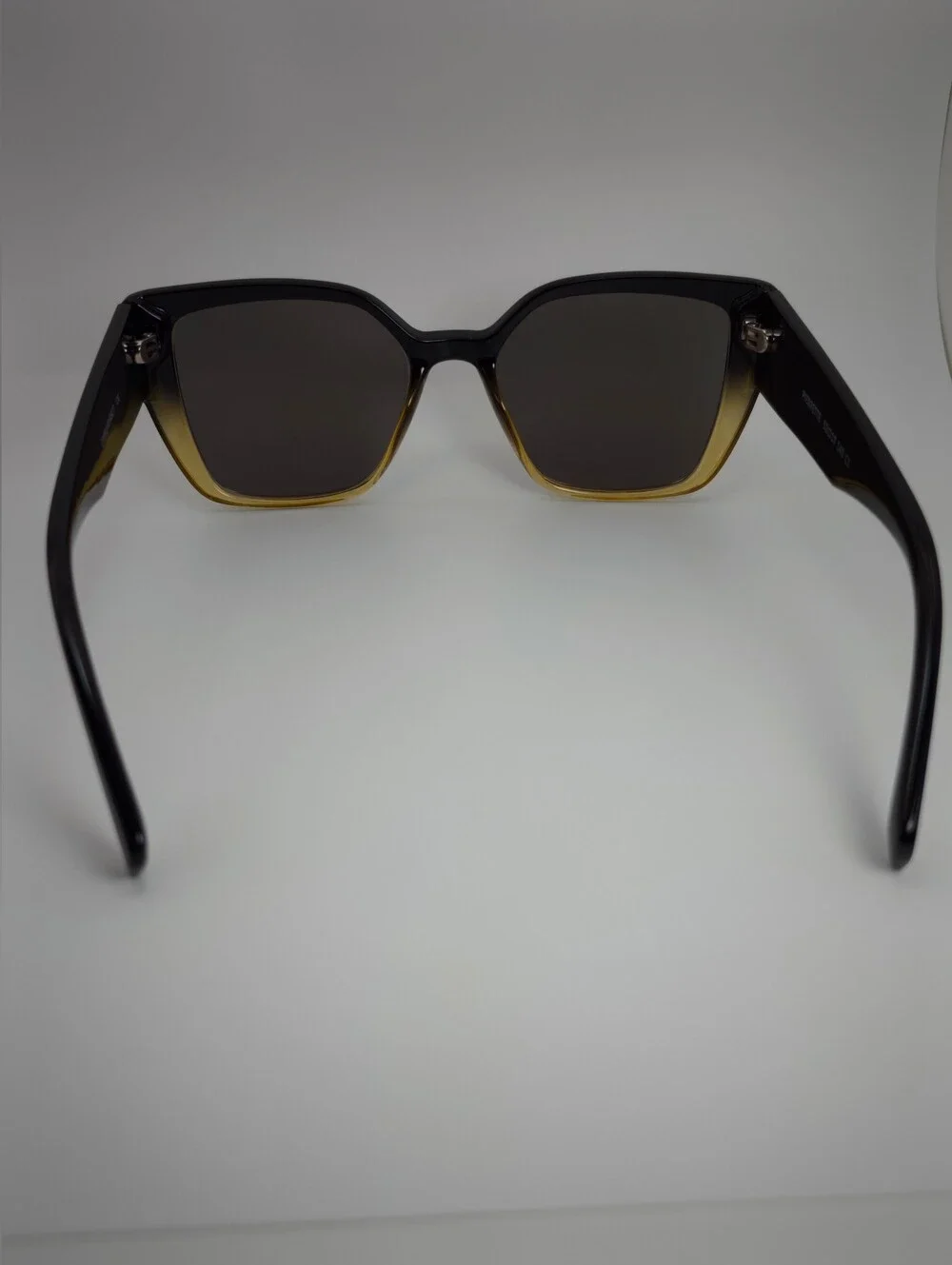 Pierrette. Women's Black to Gold Gradient Cat-Eye Sunglasses.